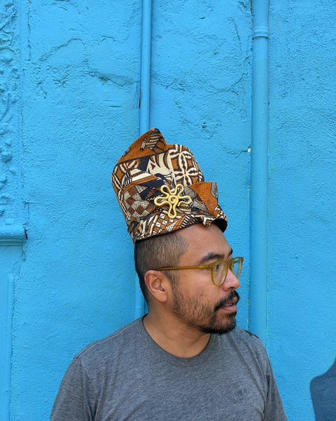 Patterned Fabric Hat with Gold Brooch