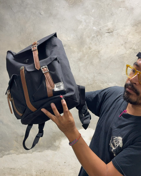 Herschel Backpack for an iPad with a Small Corner Rip, 16x14"