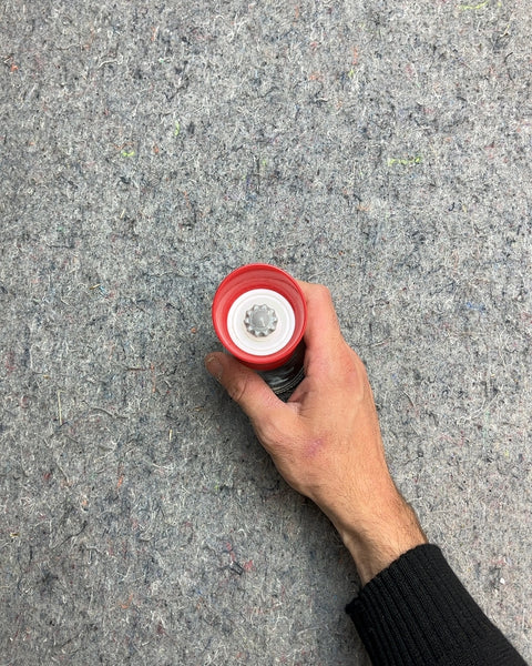 Red and Clear Glass Spice Grinder
