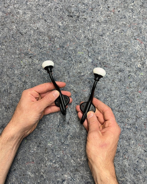 Black Metal Wall Hooks with White Ceramic Knobs