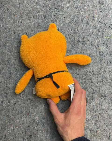 Orange Uglydoll Plush Toy That Looks Like They Are Going To The Onsen