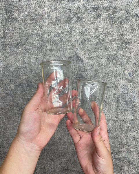 Two Tiny Glass Jars