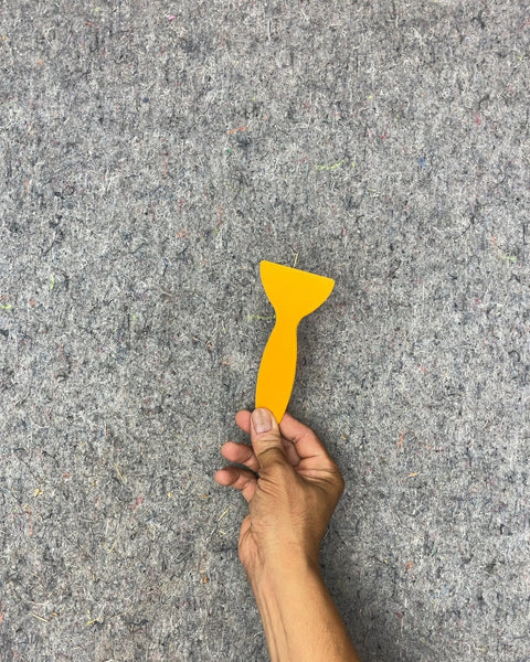 Yellow Plastic Scraper Tool