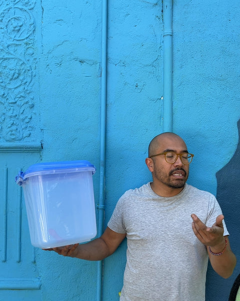 Clear Plastic Storage Container with Blue Lid