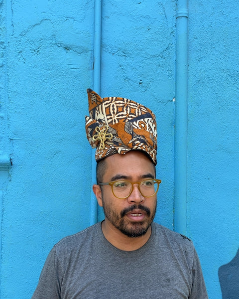 Patterned Fabric Hat with Gold Brooch