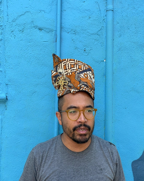 Patterned Fabric Hat with Gold Brooch