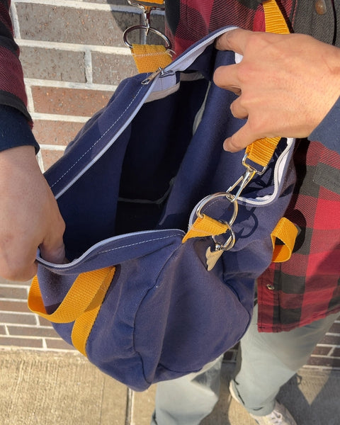 Small Blue Duffel Bag with Yellow Straps