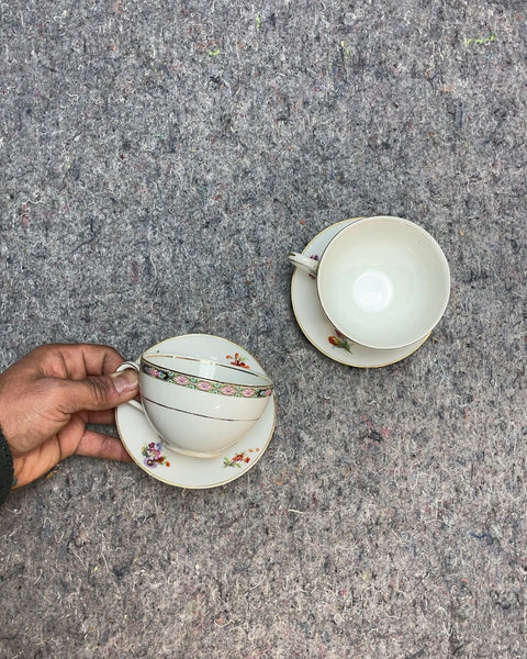 Two Floral Tea Cups and Saucers