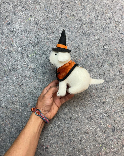 White Plush Dog with Witch Hat and Orange Cape
