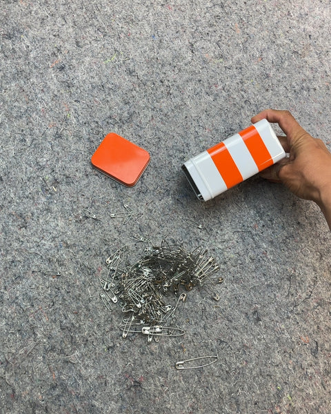 Safety Pins in Orange and White Striped Tin