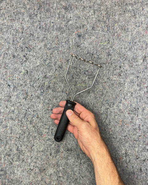 Metal Potato Masher with Black Handle