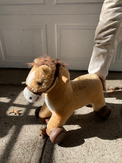 Battery Powered Horse For A Toddler To Ride