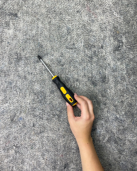 Black and Yellow Screwdriver with Phillips Head