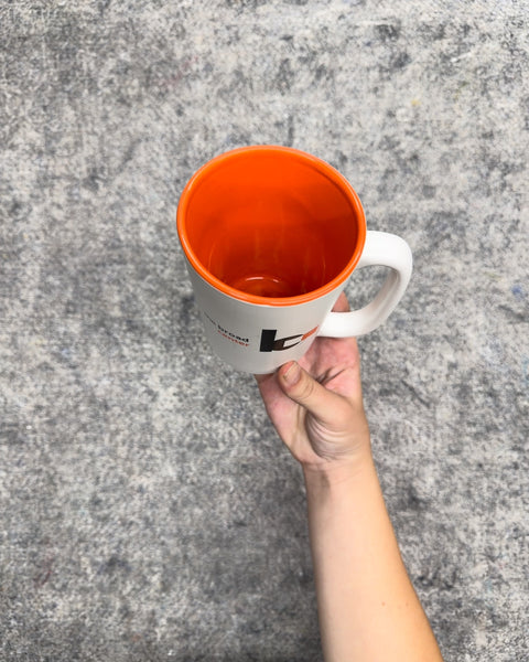 The Broad Center Ceramic Coffee Mug with Orange Interior