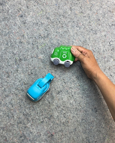 Green and Blue Toy Trucks