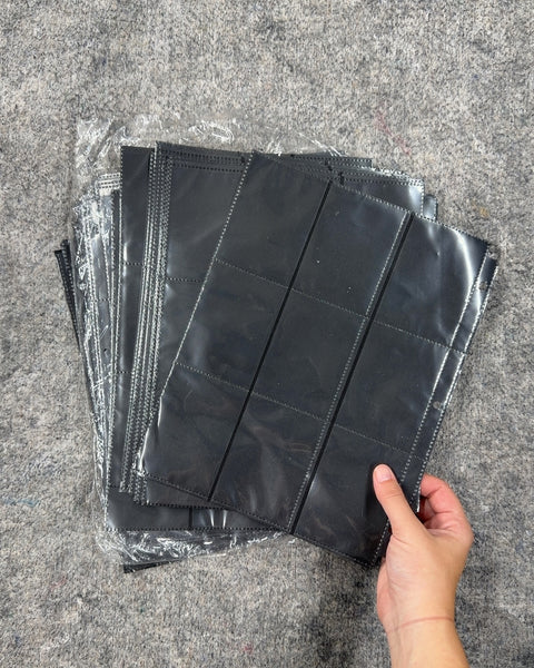 A Ton of Black Trading Card Sleeves Pages