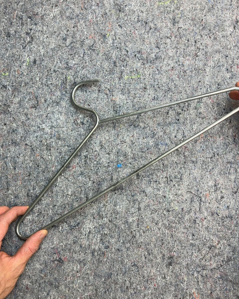 The Most Minimalist But Also Pretty Solid Metal Clothes Hanger