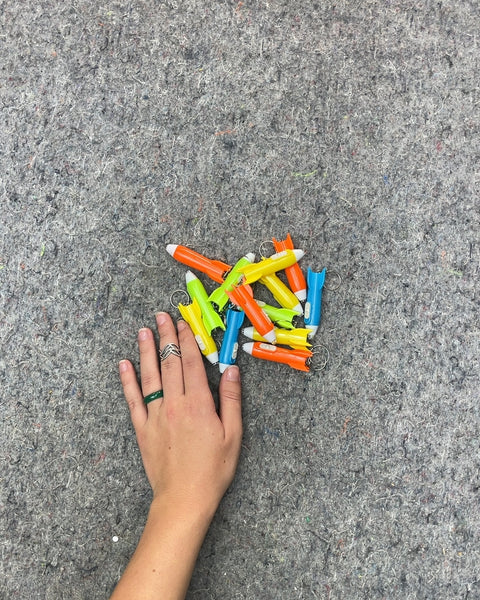 A Bunch of Mini Rocket Keychains