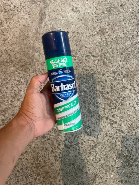 Full, yet opened, Bottle of Barbasol