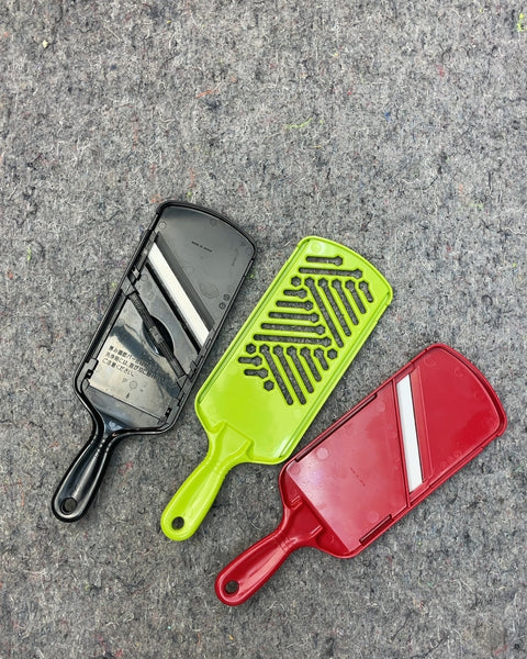 Set of Three Vegetable Graters with Container