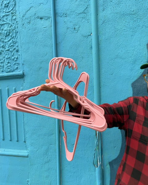 15 Or So Pink Plastic Clothes Hangers