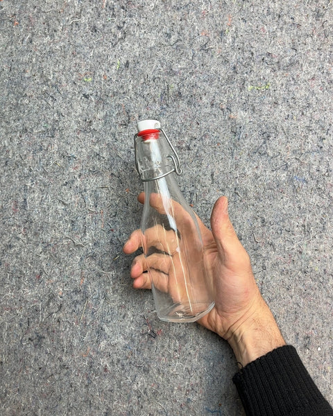 Clear Glass Bottle with Swing Top Lid