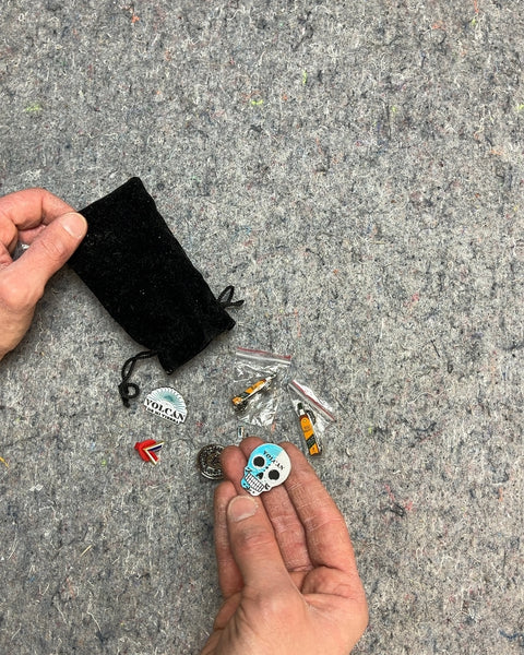 A Collection Of Pins From Someone Who Worked In Bars
