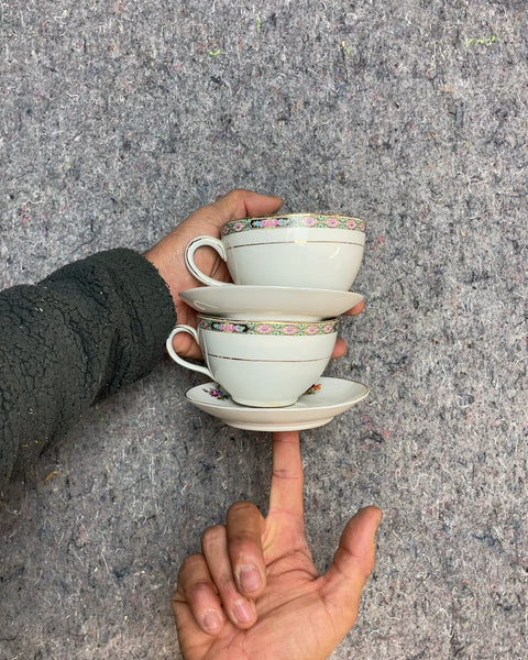 Two Floral Tea Cups and Saucers