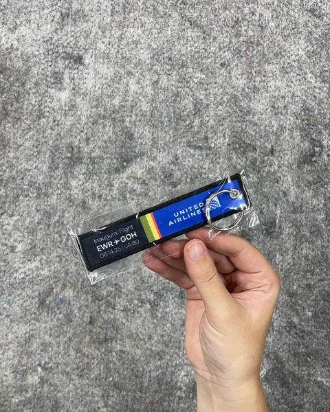 United Airlines Inaugural Flight EWR-GOH Keychain