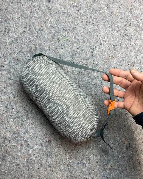 Gray Mesh Travel Pillow with Orange Buckle