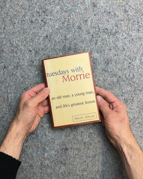 Tuesdays with Morrie by Mitch Albom