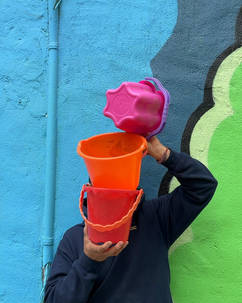Stack of Three Plastic Sand Buckets