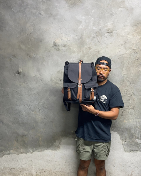 Herschel Backpack for an iPad with a Small Corner Rip, 16x14"