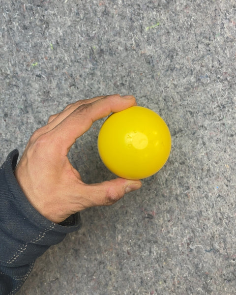 Lovevery Yellow Rattle Toy