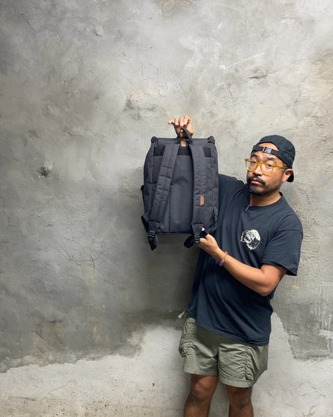 Herschel Backpack for an iPad with a Small Corner Rip, 16x14"