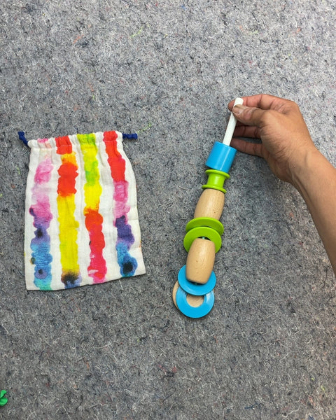 Lovevery Wooden Stacking Toy with Rainbow Drawstring Bag