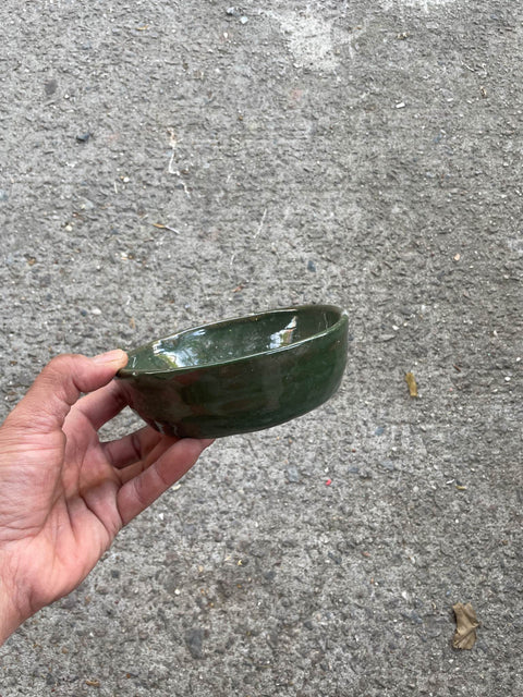 A Green Ceramic Keys Bowl