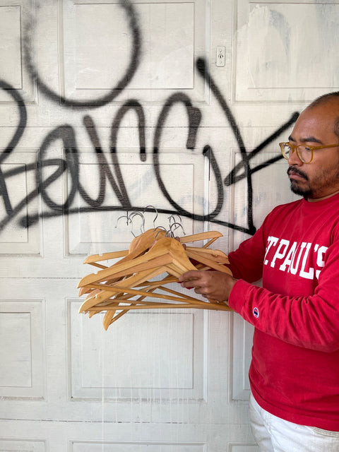 A Handful Of Wooden Coat Hangers