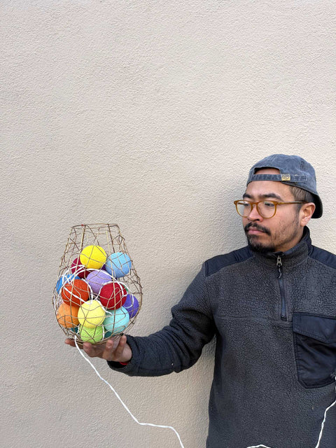 A Lamp Made Out Of Colorful Balls