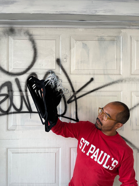 A Large Handful Of Black Velvet Hangers