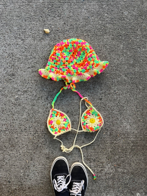 A Neon Crochet Hat And Bra Set