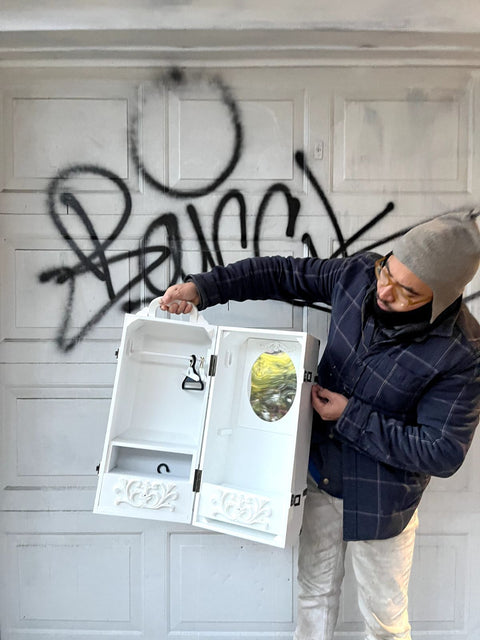 A Pretty White Wooden Toy Armoire