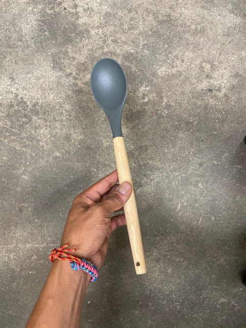 A Silicone & Wood Kitchen Spoon