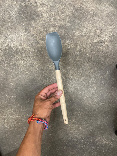 A Silicone & Wood Mixing Spoon