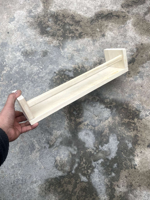 A Single Wooden Wall Shelf