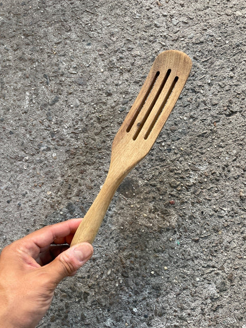 A Slotted Wooden Spatula