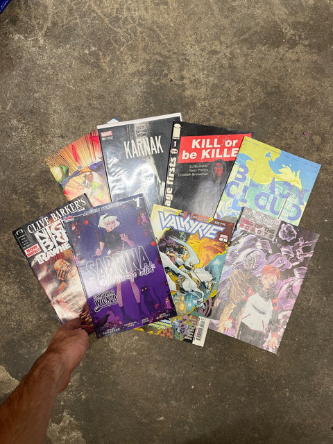 A Stash Of Comic Books