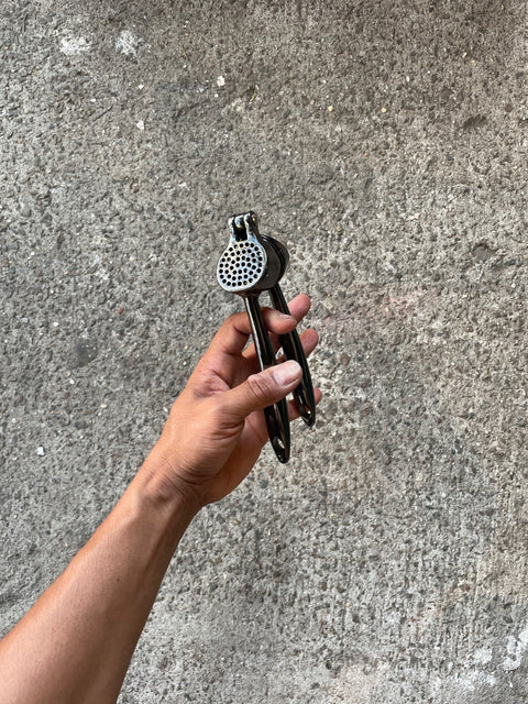 A Very Sexy Black Garlic Press