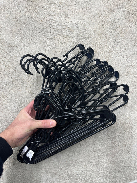 A Whole Bunch Of Plastic Kids Hangers
