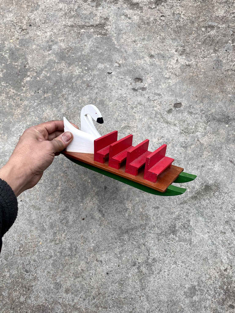 A Wooden Swan Boat for your Mantle Cuz You Have One in Your Studio